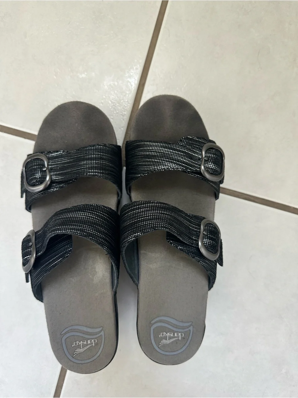Dansko Wedge Sandals with Buckle. Great shoe but wrong fit for me. Worn twice!
